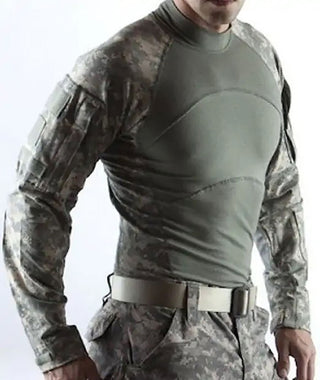 ARMY UCP FR Combat Shirt. US Army Military ACS Universal Camouflage Pattern Flame Resistant Combat Shirt. Foliage gray/green fabric with flame-resistant technology with lightweight, breathable FR fabrics. Tactical Combat Blouse with mock collar, ucp camo raglan sleeves, zippered pockets; lightweight elbow pads; concealable IR tab.  Made in U.S.A.
