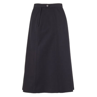 US NAVY Women's Service Dress Blue Skirt. USN Female SDB Skirt in Poly Wool. Unbelted 6-gored skirt features a left zip and button closure, upper right front waistband pocket, with an A-Line silhouette. This skirt can be paired with the US Navy Women's Service Dress Blue Jacket, Dinner Dress Blue Jacket or Dinner Dress White Jacket. Black 55/45 Polyester Wool; 100% Polyester Lining. Genuine, Official Military Uniform. Made in U.S.A.