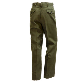 USMC Men's Green Poly/Wool Trousers. US Marine Corps Male Green Poly Wool Pants. These USMC Green slacks are worn by officers and enlisted Marines, authorized for wear as part of the service A, B or C uniform. Features zip fly, hook & slide fastened front, 2 side hip pockets, 2 back pockets with pointed flaps & button closures, and 2 1/4-inch drop belt loops. 55/45 Gabardine Polyester Wool; color USMC Green #2212. Genuine, Official Military USMC Issued Uniform. Made in U.S.A.