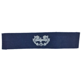 US NAVY Coverall Badge Deep Submergence - Enlisted Silver embroidery. USN embroidered badge for working coveralls. Pre-owned, used. Made in the USA.
