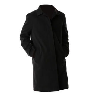 USN Military Female All Weather Rain Coat with No Belt. This is a retired/vintage style coat formerly worn by the U.S. Navy as outerwear for Service, Service Dress and Dinner Dress uniforms in inclement weather. This classic coat works in the rain, sleet, snow, crisp autumn mornings and frigid winter evenings. Features a water-repellant poplin exterior with zip out faux-fur liner. Color reads dark charcoal black (U.S. Navy color Blue #3346). Official USN Military issue. Made in the USA.