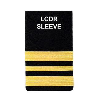 US NAVY Male Dress Blue Jacket with Lieutenant Commander Sleeve: 2 thick gold stripes bordering 1 thin gold stripe