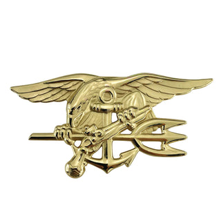 US NAVY Metal Badge Pin: Special Warfare/SEAL Trident, Full Regulation Size in Shiny Mirror Gold Finish. Insignia features an eagle clutching a trident, Navy anchor & flintlock pistol. The Special Warfare insignia, also known as the "SEAL Trident" recognizes members of the United States Navy who completed the Basic Underwater Demolition/SEAL (BUD/S) training, SEAL Qualification Training (SQT) and designated as Navy SEALs. Measures approx 2" wide x approx 1 1/8" high. Clutch back pin. Made in the USA.