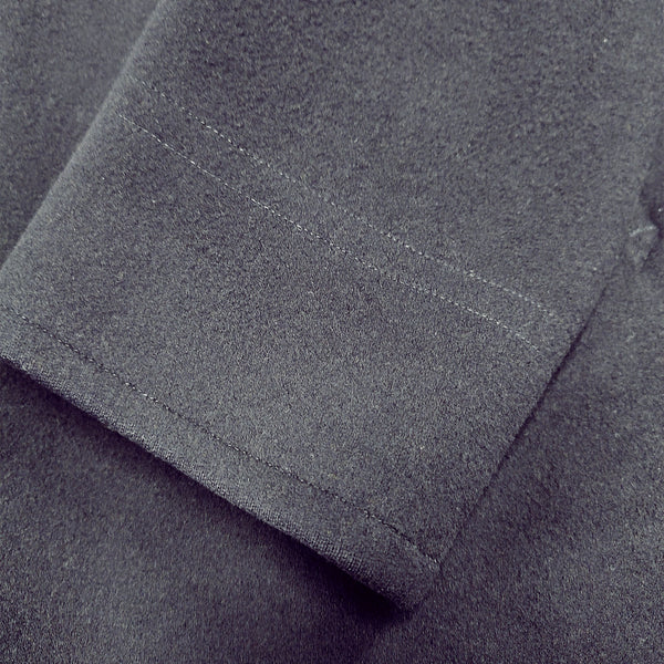 Vintage 1962 NAVY Men's Officer Reefer Peacoat in Dark Blue Wool with double-stitching above cuff along with single-stitch at cuff.
