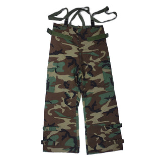 BDU Woodland Camo Chemical Protective Trousers. Men's Military Battle Dress Uniform MOPP Protective Pants, NFR in Camouflage. Cotton web suspenders; zip-fly & snap front with zipper; adjustable waist/leg tabs; side cargo pockets; reinforced seat/knees. Protects from chemical agents and is non-flame resistant. Size: Medium Long. 50/50 Nylon Cotton Ripstop. Liner: Joint Service Lightweight Integrated Suit Technology (JSLIST) approved material. Made in the USA.