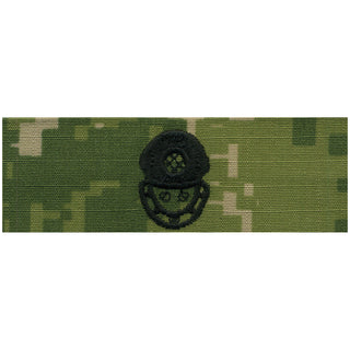 NAVY NWU Type III Badge: Diver 2nd Class. US NAVY Working Uniform Type 3 Embroidered Badge - Diver Second Class.  Official U.S. Navy tag to be used with NWU Type III Uniform. USN Certified. Black Embroidery on Green Woodland Digital Camouflage. Nylon Cotton Ripstop. Made in the U.S.A.
