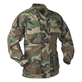BDU Woodland Camo Coat Seabees. U.S. Military Battle Dress Uniform Coat in Green Woodland Camouflage with "Seabees" insignia. Features Seabee fighting bee black logo embroidered on the left chest pocket, full button front, 4 front button-flap pockets, and button tab cinch cuffs for a more secure fit. Original US m81 Green Woodland camouflage. Nylon/Cotton Ripstop. Genuine, Official Military-issue Uniform Surplus. Made in U.S.A.