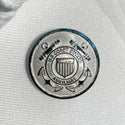 U.S. Coast Guard 36-line silver metal button with USCG insignia with a pair of crossed anchors superimposed by a life ring with shield and surrounded by a line grommet.