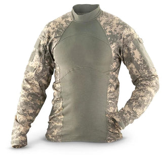 ARMY UCP FR Combat Shirt. US Army Military ACS Universal Camouflage Pattern Flame Resistant Combat Shirt. Foliage gray/green fabric with flame-resistant technology with lightweight, breathable FR fabrics. Tactical Combat Blouse with mock collar, ucp camo raglan sleeves, zippered pockets; lightweight elbow pads; concealable IR tab.  Made in U.S.A.