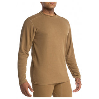 Drifire Midweight Long Sleeve Tee - Men's Coyote Brown. The DRIFIRE base layer system, designed for the U.S. military, is made of soft FR fabric with wicking/fast-drying capabilities, built-in antimicrobial properties and flame resistance using no-melt, no-drip technology. Coyote Brown, 85% Modacrylic/15% Viscose. Flame resistant fabric controls moisture & order; Dries up to three times faster than cotton. Berry compliant. Made in U.S.A.