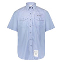 NAVY Women's Blue Utility Work Shirt - Short Sleeve. US Navy Female Blue Utility Work Short Sleeve Shirt in light blue Chambray. Made of a lightweight poly cotton chambray weave, this shirt features 2 front chest patch pockets with button flaps, button-down closure and back yoke. 65/35 Polyester Cotton Chambray. Made in U.S.A. Genuine, Official US Military Navy Uniform; USN-Certified.