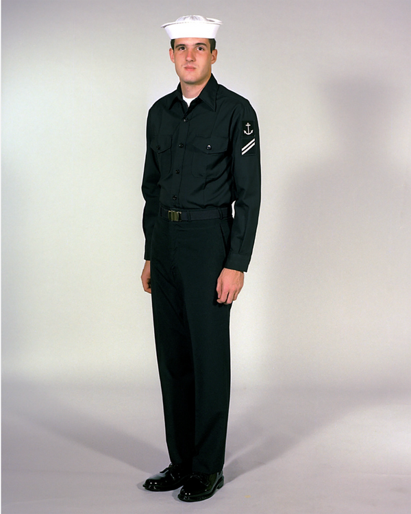 Navy Enlisted E6 & Below Winter Working Blue Uniform worn with white Dixie Cup cover.
