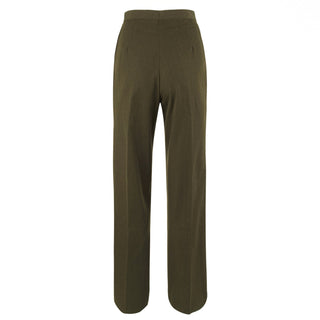 USMC Women's Green Slacks - with Pockets. U.S. Marine Corps Female Green Trousers. These pants feature straight legs with a zip-fly closure with fastened front, unbelted waist, and side pockets. The USMC Green Gabardine Slack is authorized for wear as part of the service “A”, “B” or “C” uniform. Green polyester wool gabardine; Color US Marine Corps hue 2212. Made in U.S.A.