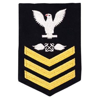 USN Male Rating Badge: E6 Aviation Boatwains Mate (AE) - Standard Seaworthy Gold on Blue for Enlisted Service Dress & Dinner Dress Blue uniform. Gold chevrons indicate 12 years of consecutive good conduct.  - Fabric: Gold & White Embroidery on Dark Blue Wool Serge. - US Navy Certified - Made in the USA