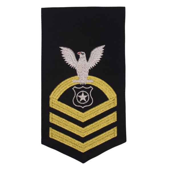 USN Male Rating Badge: E-7 Master-at-Arms (MA) - Standard Seaworthy Gold on Blue for Service Dress & Dinner Dress Blue uniform. Gold chevrons indicate 12 years of consecutive good conduct. - CPO embroidered Regulation Gold Chevron on Blue with White Eagle and Designator. - Gold & White Embroidery on Dark Blue Polyester Wool. - US Navy Certified - Made in the USA