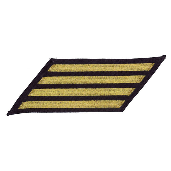 NAVY Men Enlisted Service Stripes: 4 - Standard Gold on Blue. US NAVY Hash Marks, Male Service Stripes Enlisted: set of four - Seaworthy Gold on Blue for SDB or DDB Uniform. Gold diagonal stripes on regulation dark blue fabric. Standard/Seaworthy Gold: Embroidered gold colored thread on regulation blue-black serge wool. Male E1-E6 hashmarks service stripes measure 5-1/4" long x 3/8" wide. Made in the USA.