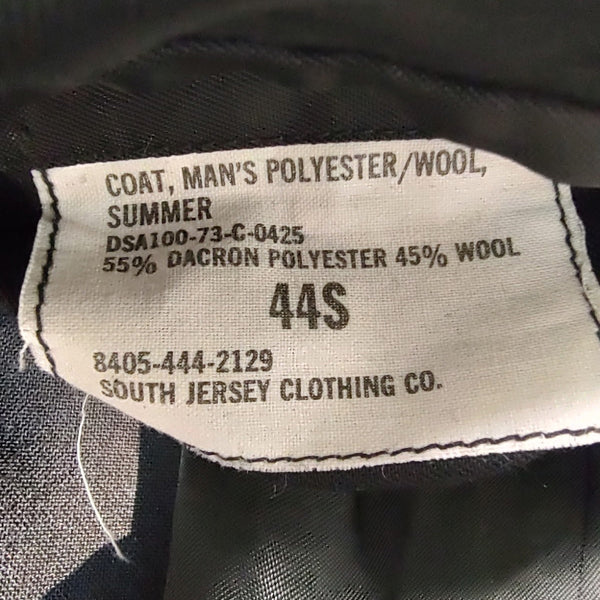 File:Clothing tag on Navy Issued Jacket, Cold Weather, Permeable built by  the Vanderbilt Shirt Company.jpg - Wikimedia Commons