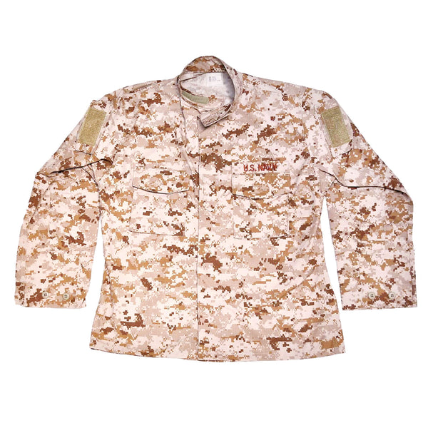US NWU Type II AOR1 Desert Blouse. Navy Working Uniform Type 2 AOR-1 Shirt Desert Tan Digital Camouflage. Special purpose organizational uniform worn by NSWDG/DEVGRU, SEALs, SARC, EOD Technicians. Genuine Military Uniform. Banded collar, 5 concealed buttons, rank tab, reinforced elbows, 2 chest & 2 angled shoulder pockets with button/velcro closures. Items may include velcro above the pockets. Genuine Military Uniform. Tan sand khaki brown camo with USN Insignia. 50/50 Nylon Cotton Ripstop. Made in U.S.A.
