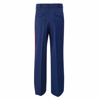 USMC Men's Dress Blue Trousers with Red Stripe - Enlisted. U.S. Marine Corps Male Dress Blue Pants with red blood stripe for NCO & SNCO. Poly-wool pants feature a zip fly, hook & slide closure, side slash pockets, two buttoned back flap pockets, and 1 1/8"wide wool scarlet red side stripe. Genuine, Official Military U.S. Marine Corps Uniform. Polyester/Wool Gabardine. Made in U.S.A.