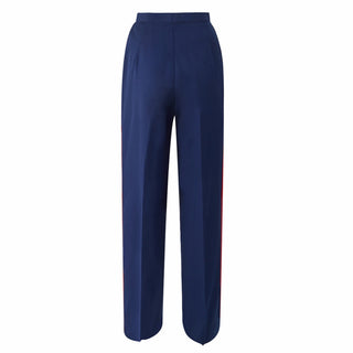 USMC Women's Dress Blue Trousers with Red Stripe - Enlisted. U.S. Marine Corps Female Dress Blue Pants with red blood stripe for NCO & SNCO. Poly-wool pants feature a zip fly, hook & slide closure, side slash pockets, two buttoned back flap pockets, and 1 1/8"wide wool scarlet red side stripe. Genuine, Official Military U.S. Marine Corps Uniform. Polyester/Wool Gabardine. Made in U.S.A.