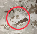 US Marine Corps Combat Utility Uniform (MCCUU) MARPAT Desert Camouflage with USMC insignia in pattern.