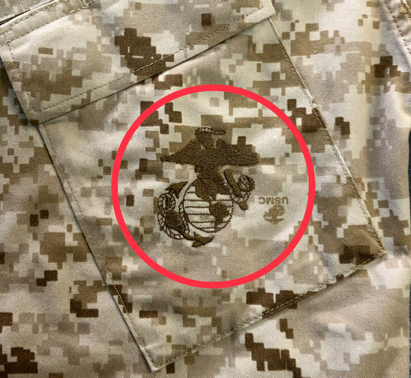 USMC in Marine Pattern tan digi-cammies. USMC embroidered insignia on front pocket.