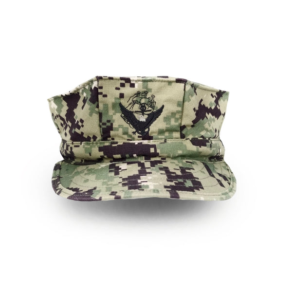 US Navy Working Uniform Type 3 Woodland Digital Camouflage 8-Point Hat Cap with embroidered ACE insignia. Genuine, Official Military NWU Uniform- Pattern: Green Digital Woodland Camo- ACE insignia on front- Fabric: 50/50 Nylon Cotton Ripstop- Made in the USA- Condition: Good, pre-owned/gently used unless marked as NEW.