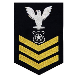 USN Male Rating Badge: E6 Master At Arms (MA) - Standard Seaworthy Gold on Blue for Enlisted Service Dress & Dinner Dress Blue uniform. Gold chevrons indicate 12 years of consecutive good conduct.