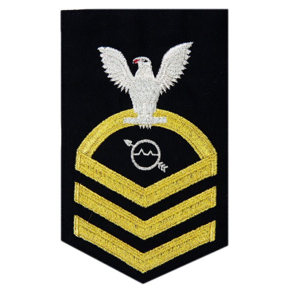 USN Male Rating Badge: E-7 Operation Specialist (OS) - Standard Seaworthy Gold on Blue for Service Dress & Dinner Dress Blue uniform. Gold chevrons indicate 12 years of consecutive good conduct.  - CPO embroidered Regulation Gold Chevron on Blue with White Eagle and Designator.  - Gold & White Embroidery on Dark Blue Polyester Wool. - US Navy Certified - Made in the USA