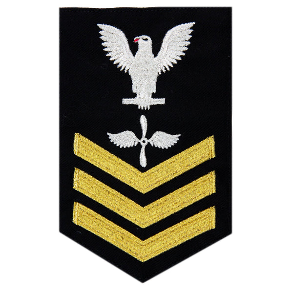 USN Male Rating Badge: E6 Aviation Machinists Mate (AD) - Standard Seaworthy Gold on Blue for Enlisted Service Dress & Dinner Dress Blue uniform. Gold chevrons indicate 12 years of consecutive good conduct.
