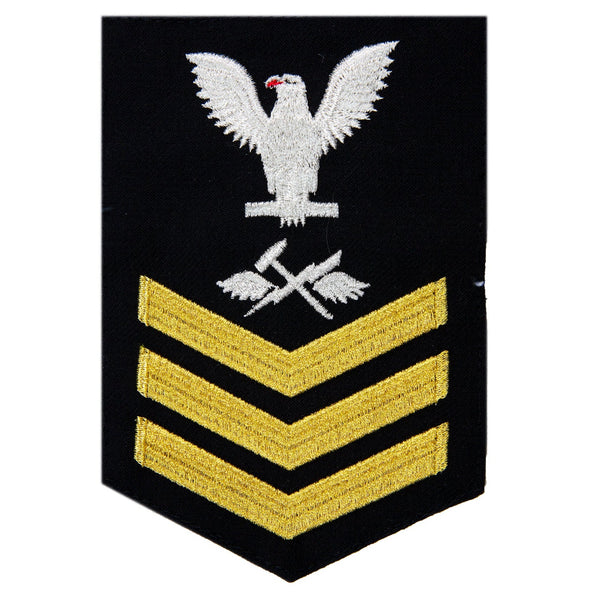 USN Male Rating Badge: E6 Aviation Support Equipment Technician (AS) - Standard Seaworthy Gold on Blue for Enlisted Service Dress & Dinner Dress Blue uniform. Gold chevrons indicate 12 years of consecutive good conduct.