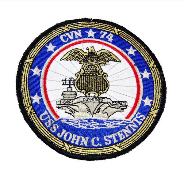 US Navy Military Aircraft Carrier Patch. The U.S.S. John C. Stennis (CVN-74) is the seventh Nimitz-class nuclear-powered supercarrier in the United States Navy, named for Senator John C. Stennis of Mississippi.  - Round embroidered patch - Measures: 5 x 5 inches - Embroidered twill; Merrowed edge - Colors: Blue, red, white, gray with yellow gold & black border - Authentic, Official US Military Patch - Condition: Good, pre-owned/gently used unless marked as NEW.