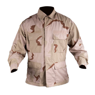 DCU Tri-Color Desert Camo Blouse Seabees. U.S Military Tri-Color Desert Camouflage Shirt Jacket with "Seabees" insignia. The DCU coat features a Seabee fighting bee brown logo embroidered on the left chest pocket, button front, 4 button-flap pockets, and button tabs at the wrist cuffs. Nylon/Cotton Ripstop. Genuine, Official Military-issue Uniform Surplus. Made in U.S.A.