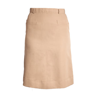 NAVY Women's Service Skirt - Khaki CNT. US Navy Female Khaki Certified Navy Twill Skirt. This skirt is the retired style for USN Officer & (CPO) Chief Petty Officer Service Khaki uniforms; originally worn with the Khaki Short Sleeve Shirt of the same fabric. Features a belted waistband, back zip closure, A-line shape and 2 front welt pockets. Tan Khaki 100% Polyester (Certified Navy Twill). Made in U.S.A. Genuine, Official US Military Navy Uniform.