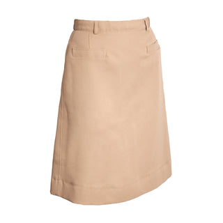 AS-IS Condition NAVY Women's Service Skirt - Khaki CNT. US Navy Female Khaki Certified Navy Twill Skirt. This skirt is the retired style for USN Officer & (CPO) Chief Petty Officer Service Khaki uniforms; originally worn with the Khaki Short Sleeve Shirt of the same fabric. Features a belted waistband, back zip closure, A-line shape and 2 front welt pockets. Tan Khaki 100% Polyester (Certified Navy Twill). Made in U.S.A. Genuine, Official US Military Navy Uniform.