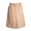NAVY Women's Service Skirt - Khaki CNT. US Navy Female Khaki Certified Navy Twill Skirt. This skirt is the retired style for USN Officer & (CPO) Chief Petty Officer Service Khaki uniforms; originally worn with the Khaki Short Sleeve Shirt of the same fabric. Features a belted waistband, back zip closure, A-line shape and 2 front welt pockets. Tan Khaki 100% Polyester (Certified Navy Twill). Made in U.S.A. Genuine, Official US Military Navy Uniform.