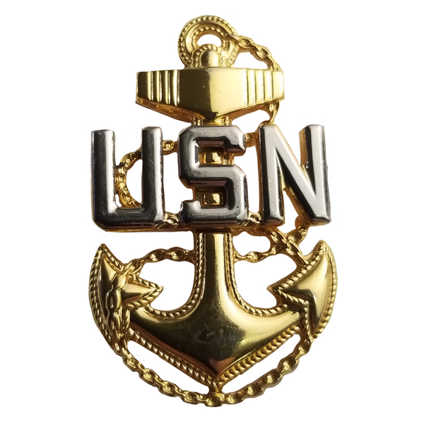US NAVY Metal Cap Device for E-7 Chief Petty Officer in miniature size. Gold metal fouled anchor insignia with silver mirror finish USN.  - Measures approx: 1 1/4" high x 3/4"wide - Sold individually.
