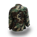 M65 BDU Green Woodland Field Jacket. Vintage Seabees M-65 Battle Dress Uniform Woodland Camo Field Coat. This Cold Weather Field Coat is a classic outerwear jacket in the BDU woodland camouflage pattern. Features an upper left pocket embroidered with Seabees insignia logo, heavy duty front YKK zipper closure with snap storm-flap, snap chest pockets, 2 snap waist pockets, and shoulder epaulets. Does not include liner. Made in 1987. 50/50 Cotton/Nylon. Genuine Military-issue uniform. Made in the U.S.A.