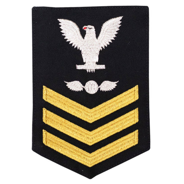 USN Female Rating Badge: E6 Aviation Electrician's Mate (AE) - Standard Seaworthy Gold on Blue for Enlisted Service Dress & Dinner Dress Blue uniform. Gold chevrons indicate 12 years of consecutive good conduct.