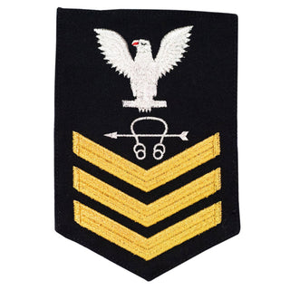 USN Male Rating Badge: E6 Sonar Technician (ST) - Standard Seaworthy Gold on Blue for Enlisted Service Dress & Dinner Dress Blue uniform. Gold chevrons indicate 12 years of consecutive good conduct.