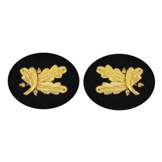 US NAVY Sleeve Device: Supply Corps Officer for Service Dress Blue uniform. Gold embroidery on dark blue/black wool. Sold in Pairs.  - Genuine Military Uniform Item. - Made in the USA - Condition: Good, pre-owned/gently used unless marked as NEW.