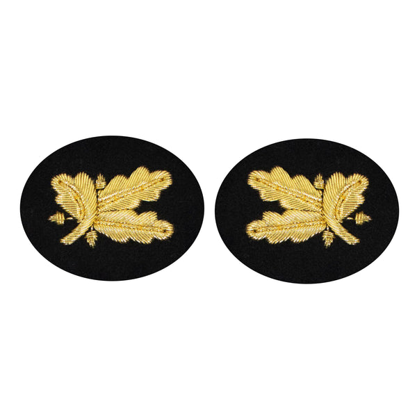 US NAVY Sleeve Device: Supply Corps Officer for Service Dress Blue uniform. Gold embroidery on dark blue/black wool. Sold in Pairs.  - Genuine Military Uniform Item. - Made in the USA - Condition: Good, pre-owned/gently used unless marked as NEW.